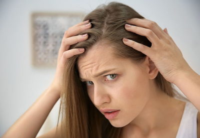 Female Hair Loss: Causes, Symptoms and Treatments